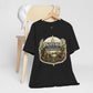 Black Nature Is Not Alternative t-shirt hanging on a wooden hanger with vintage botanical artwork on the front.
