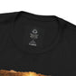 Close-up of black The First Pharmacy Was a Garden t-shirt collar and printed botanical artwork detail.